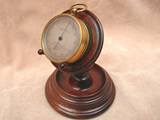 J H Steward 19th century pocket barometer with Rosewood stand.